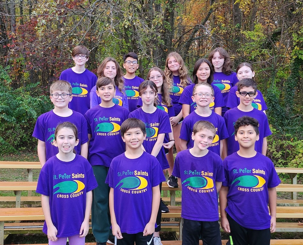 St. Peter School Cross Country Team wearing their purple uniform shirts