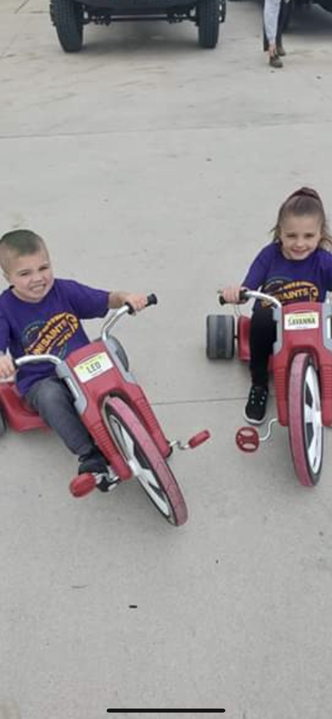Leo and his sister Savannah getting ready to race on their Big Wheels!